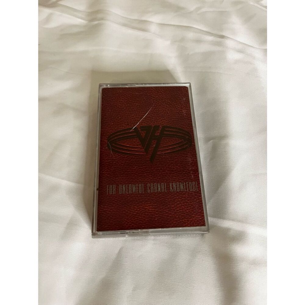 Warner Bros. Electronics Other cassette — deep red with black logo